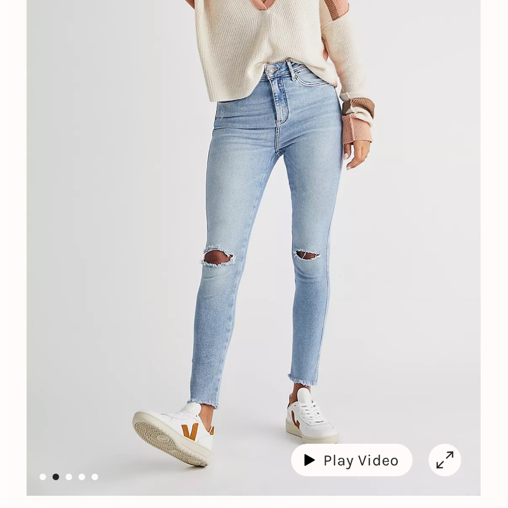 Size 28, high wasted black skinny jeans with holes in knees